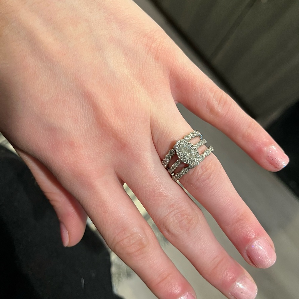 Beautiful, like new 1.5 carat marquis cut Bridal set, appraised at 7k.